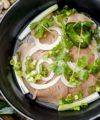 Beef noodle soup with rare beef