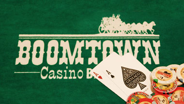 Boomtown Casino Biloxi table velvet with Boomtown chips and 2 aces